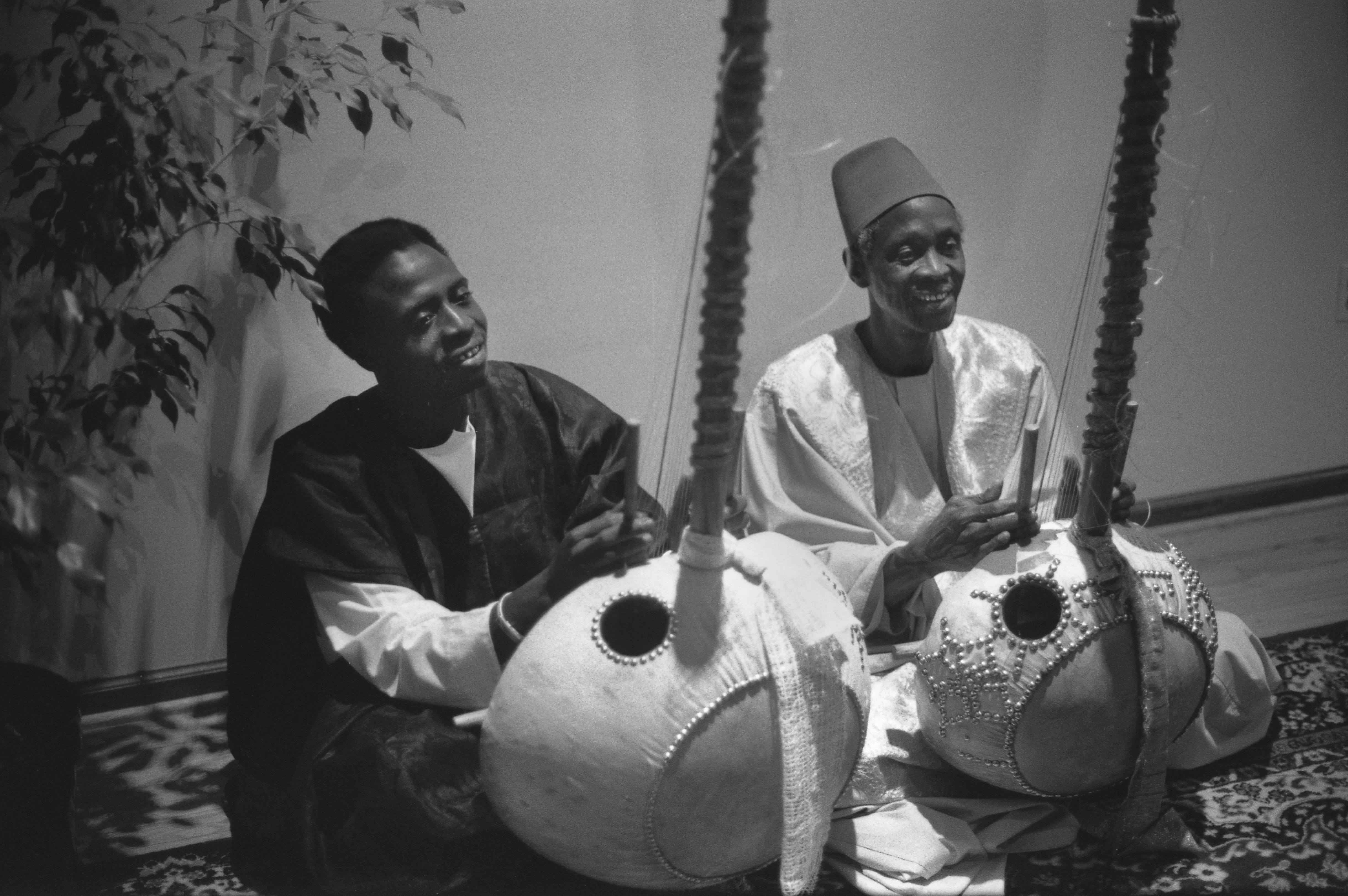 Bai_and_Dembo_Konte_playing_kora__photo_by_Marc_Pevar