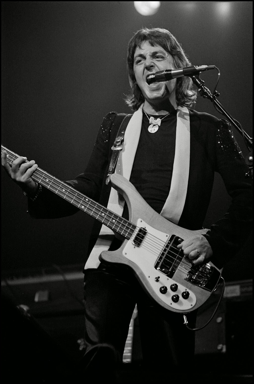 Paul_jamming_on_bass_with_his_mullet_unf_bby._Rock_show._Wings._Super_favorite
