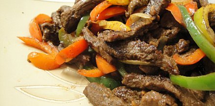 Beef stir-fry with peppers by Womad 2014 guest Abundance Mutori of Mokoomba